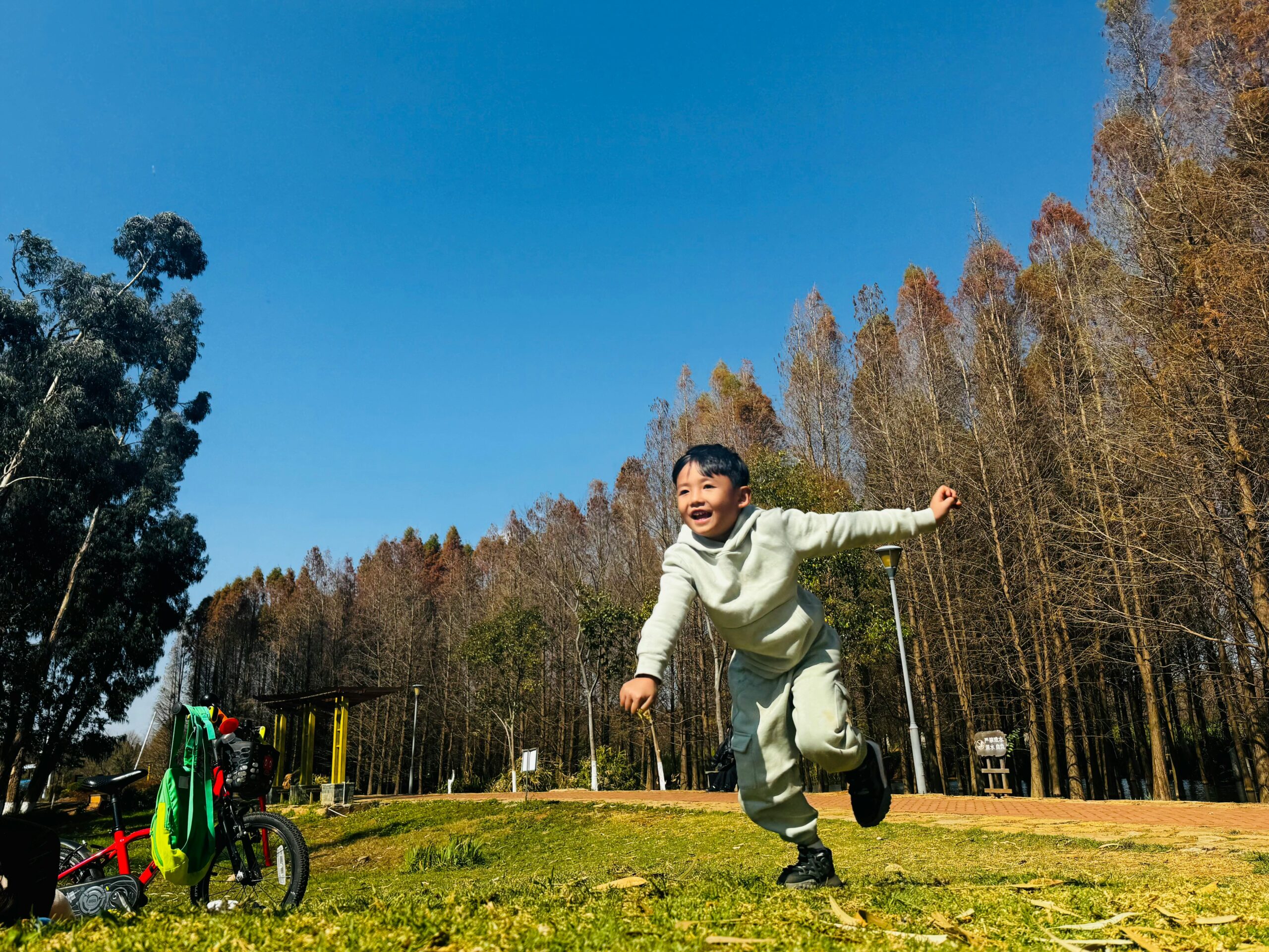 boy running on grass
